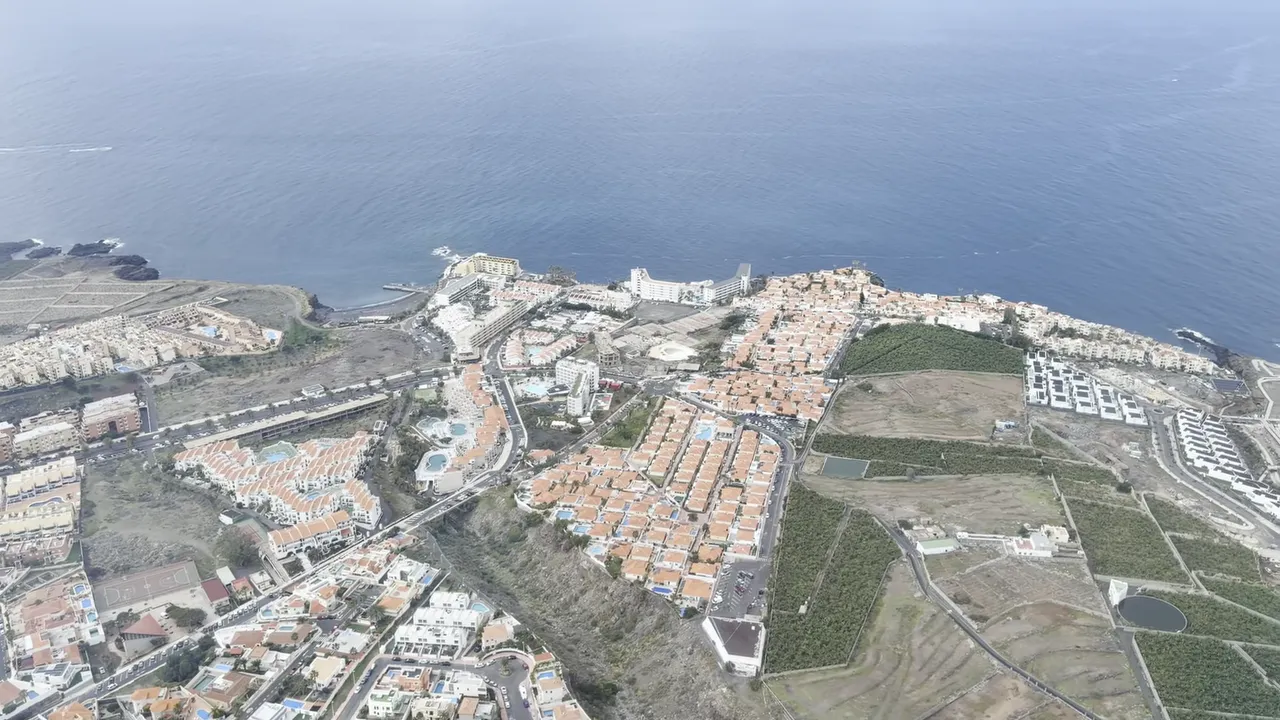aerial-view-of-tenerife-coastline-and-resort-neighborhoods-from-a-helicopter-2